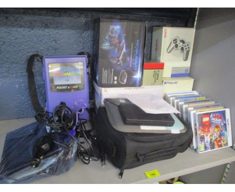 A selection of electrical items to include a Toshiba DVD player, a sat nav, a Polaroid and other items 