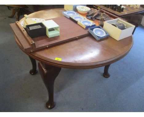 A 1920s mahogany extending dining table with extra leaf and on cabriole legs, 27 1/4" h x 41 1/4"w 