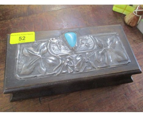 A late 19th/early 20th century oak box with enamel to the top 