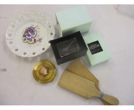 A Concorde glass paperweight by Crystal Treasures, vintage butter patters, a ribbon plate and a vintage compact 