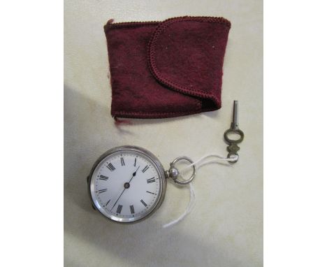 A Victorian silver cased ladies key-wound pocket watch with open face, white enamel dial with Roman numerals, with key 