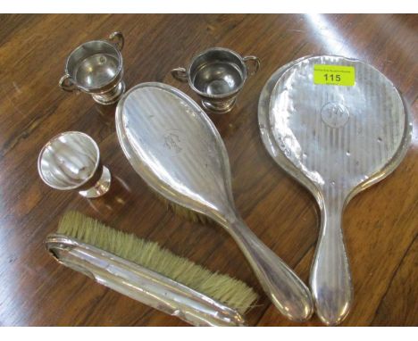 Mixed silver to include a dressing table set, two salts and an egg cup 