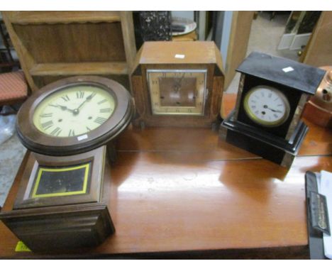 Three clocks to include a black marble cased mantle clock, an inlaid example and a drop dial clock 