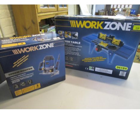 A boxed Work Zone Router table and a boxed Work Zone 1200 w router 