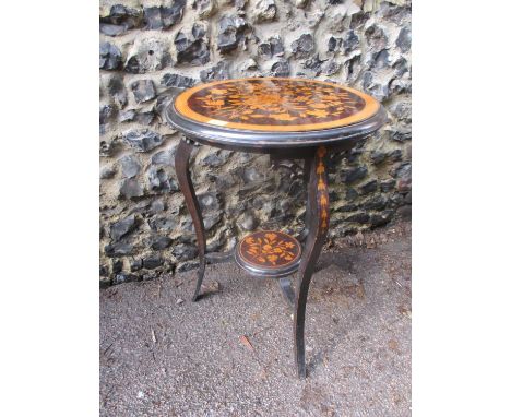 A Victorian stained and satinwood occasional table, the two tiers decorated with bouquets of flowers, on cabriole legs 