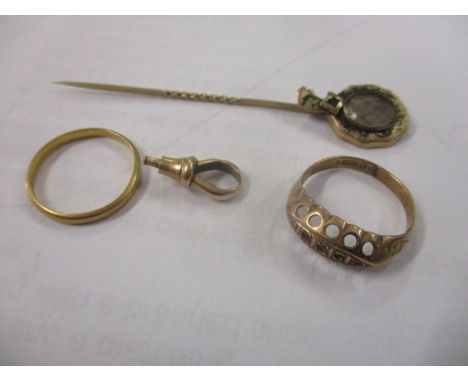 Jewellery and yellow metal to include a 22ct gold wedding ring 1.6g, a 9ct gold ring minus the stones, a stick pin and a clas