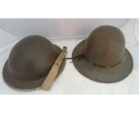 A WWII brodie helmet and fire watcher's type