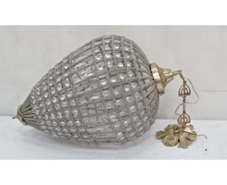 A cut glass lamp shade