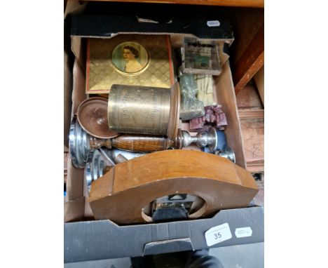 A box of collectables to include a mantle clock, candle sticks and figures etc. 