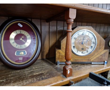 An Art Deco mantle clock and a wall clock. 