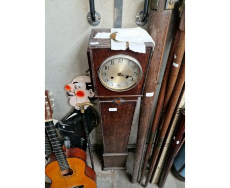 An oak Grand daughter clock 