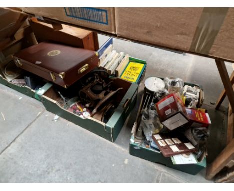 Three boxes of assorted items including metal cast iron doorstop, downlights, old weighing scales, display case and a six win