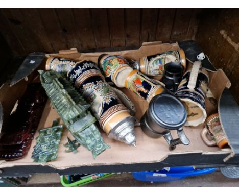 A box containing lidded steins, and a Jade Dragon boat on a plinthCondition:- (jade dragon boat only):- General wear through 
