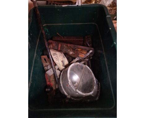 A box of tools including planes, lamp, etc. 
