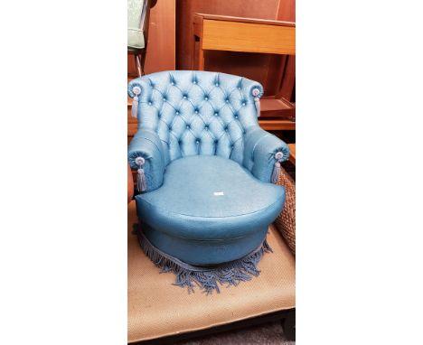 A vintage button back bedroom chair. 