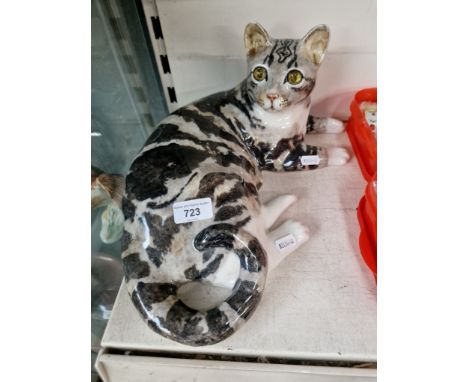 A life size ceramic cat with glass eyes. Signed to base but signature illegibleCondition:- Good, no sign of any damage or rep