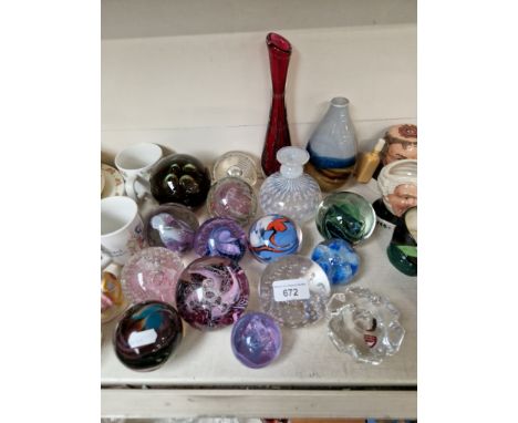 Glassware to include 12 paperweights, including Caithness and Wedgwood; vases including signed piece, and Orrefors candle hol