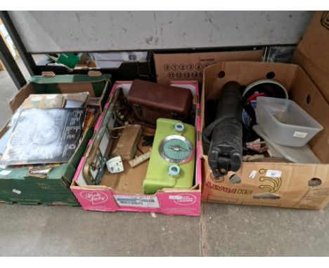 Seven boxes of assorted items to include boxed sander, boxed food vacuum sealer machine, childrens books, field telephone and