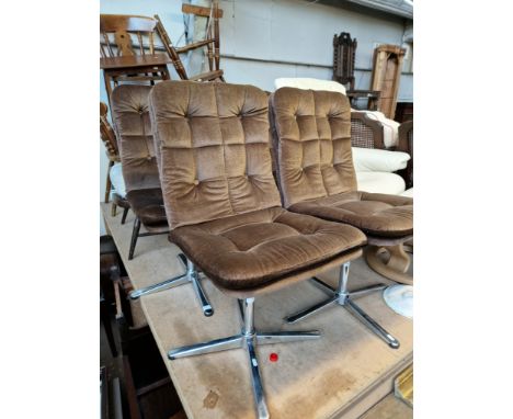 A set of four mid 20th century swivel chairs by Peak furniture together with a vintage metal lamp stand. 