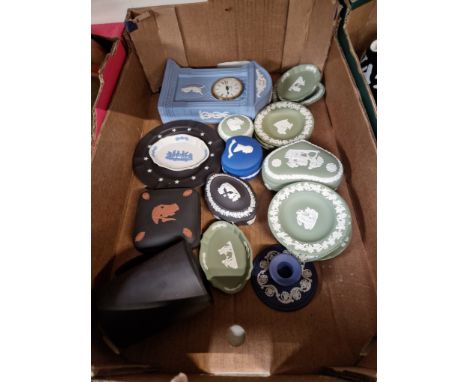 A box of Wedgwood jasperware - appx 20 pieces in various colours including black, green, white, and a blue mantle clock 