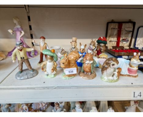 Various Beatrix Potter figurines and ceramics including Beswick, Royal Albert and Royal Doulton, etc, 15 pieces in total.Cond