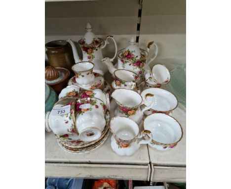 Royal Albert Old Country Roses tea and coffee wares. 34 pieces including teapot, coffee pot, cups, plates, saucers, milk jug 