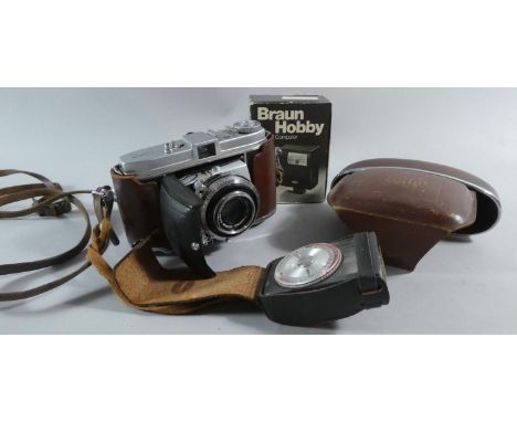 A Vintage Leather Cased Kodak Retina 1B Camera Together with a Braun Flash Gun and Vintage Light Meter 