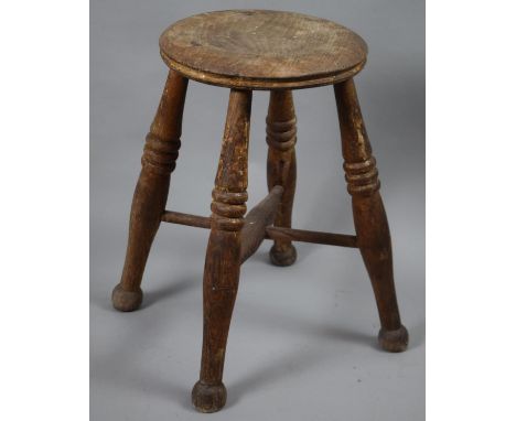 A Vintage Circular Topped Wooden Stool with Four Turned Legs, 28.5cm Diameter 