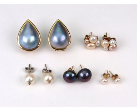 A collection of earrings, comprising; a pair of pear-shaped grey-stained mabe pearl earrings with clip and post fittings, sta