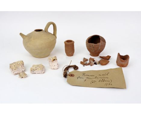 A collection of pottery to include an oil lamp, the remains of three small vases and some fragments of mosaic (qty).