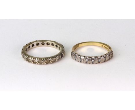 A small diamond nine stone half-eternity ring, stamped '18ct gold', 3.2g gross; together with a paste eternity ring, indistin