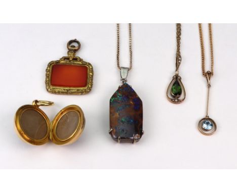 A small collection of jewellery, comprising; an Edwardian rose gold, pear-shaped green tourmaline and half-pearl drop-shaped 