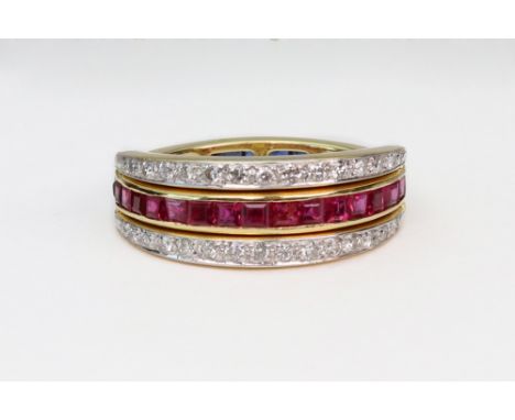 A modern Italian gold, sapphire ruby and diamond 'night and day' ring, the central band of calibre rubies and sapphires flank