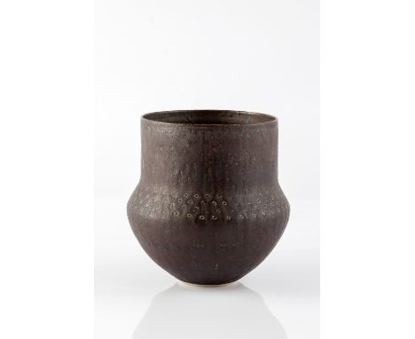 Lucie Rie (1902-1995) Vase, circa 1970 dripped manganese glaze, of shouldered form  impressed circular motifs to the shoulder