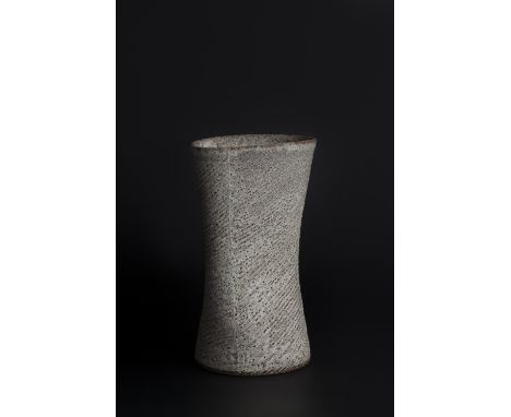 Lucie Rie (British, 1902-1995) Vase stoneware, of squeezed form  pitted white and grey glaze panelled and with incised decora