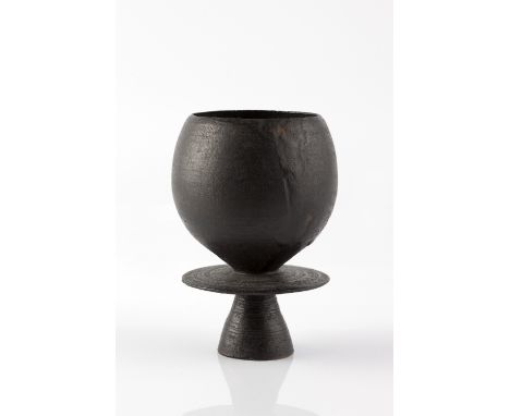 Hans Coper (German/British, 1921-1980) Cup on foot with central disc, circa 1965 black matt glaze with manganese drip incised