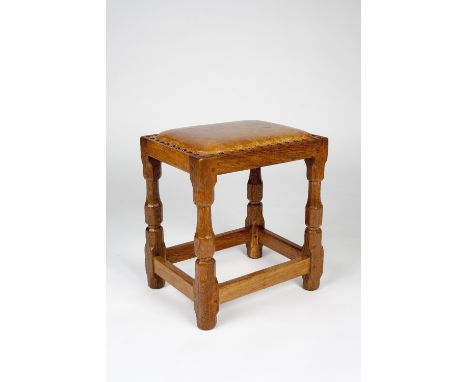 Sid Pollard (British, 20th Century) Oak Stool on octagonal shaped supports and leather top 42cm high, 35.8cm across.