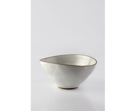 Lucie Rie (British, 1902-1995) Bowl, late 1950s white glaze impressed potter's seal 7cm high, 15cm across. Provenance: Peter 