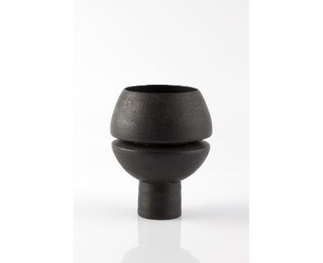 Hans Coper (German/British, 1921-1980) Composite form  black matt glaze incised spiral decoration to the foot impressed potte