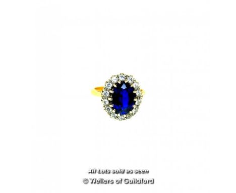 Vintage Synthetic Sapphire And Diamond Cluster Ring, Oval Cut Synthetic Sapphire Weighing An Estimated 2.80cts, With A Surrou