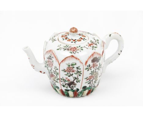 A teapot and coverChinese export porcelainMoulded petals and floral polychrome  "Famille Rose" enamelled decoration Kangxi re