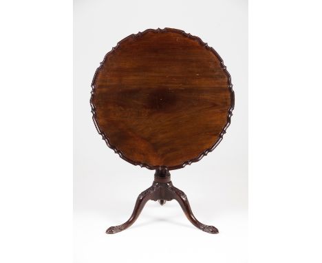 A D.José style tripod tableMahogany and other timbersScalloped tilt topFluted shaftCarved decoration to legsPortugal, 19th / 