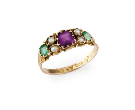 A Victorian ringGold, 19th centuryChased band set with 1 ruby, 2 emeralds and 4 micro pearlsUnmarked in compliance with Decre