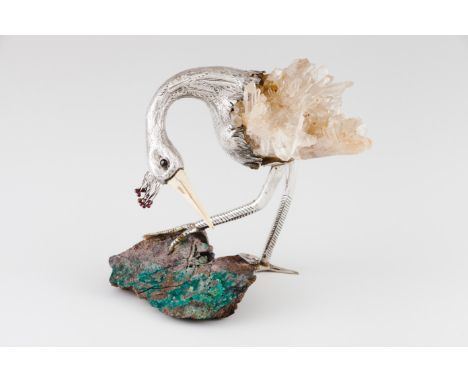 A Luiz Ferreira long legged birdSilverMoulded, engraved and chased sculpture  applied onto a quartz crystalIvory beak and gar