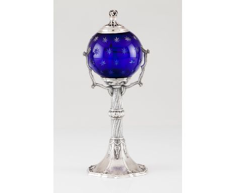 An unusual lampPortuguese silverNight light or oratory lampStar engraved blue glass shade on a neo-manueline style columnRemo