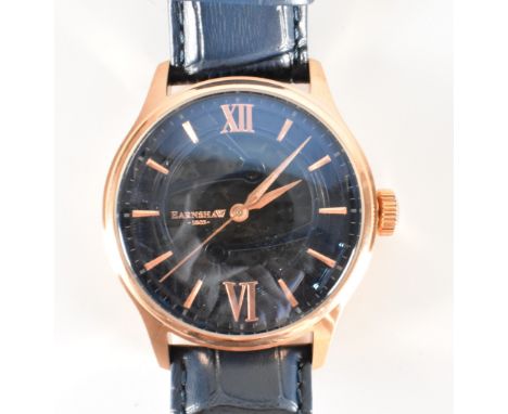 An Earnshaw automatic 1805 gentleman's skeleton wrist watch with matching Earnshaw pen. The watch having a round face with gi