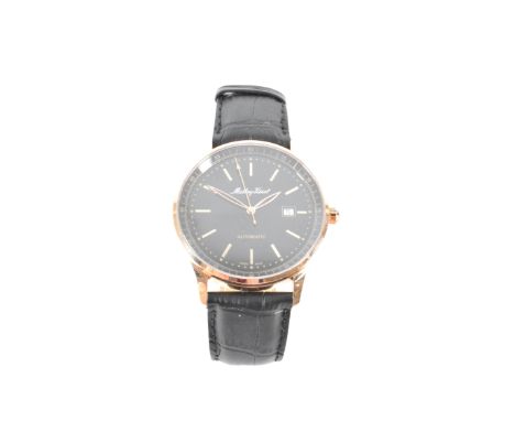 A Mathey - Tissot automatic wrist watch. The watch having a round black face with baton markers to the chapter ring and date 