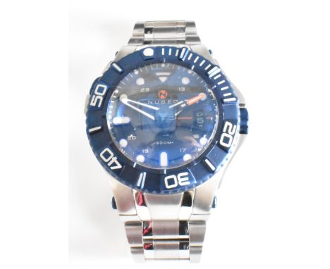 A Nubeo gentleman's wrist watch. The watch having a round face with baton and dot numerals to the chapter ring and aperture a