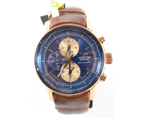 A Vostok Europe limited edition Alltimer chronograph water resistant wrist watch. The watch having a round blue face with ros