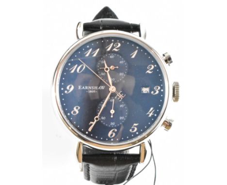 An Earnshaw&nbsp; gentleman's wrist watch. The watch having a round face, arabic numerals to the chapter ring, aperture at th